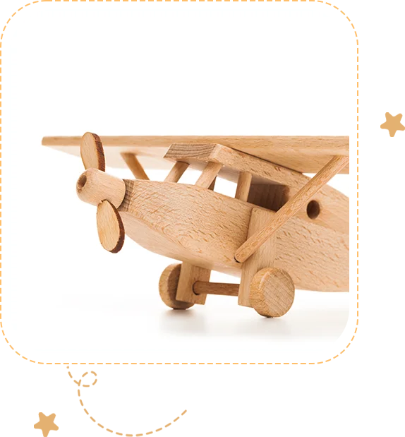 A wooden airplane is shown with the bottom of it.