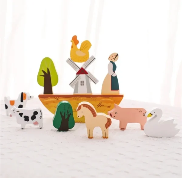 A wooden toy set of animals and people.