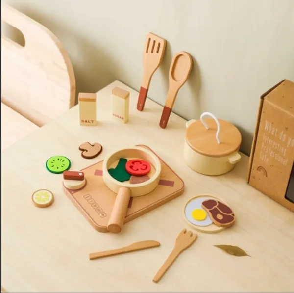 A wooden play set of food and utensils.