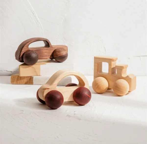 A group of wooden toys sitting on top of a table.