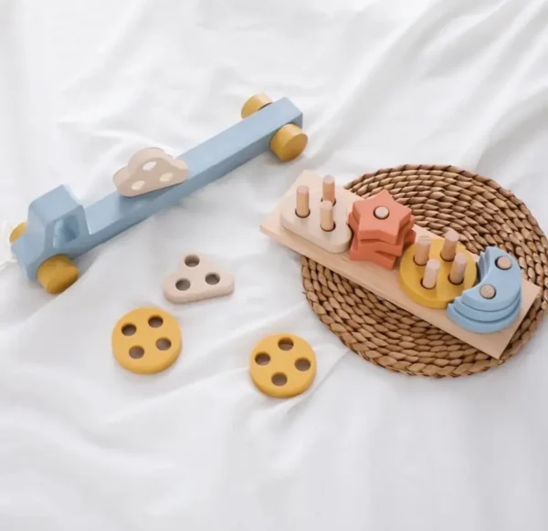 A wooden toy set of cookies and ice cream.