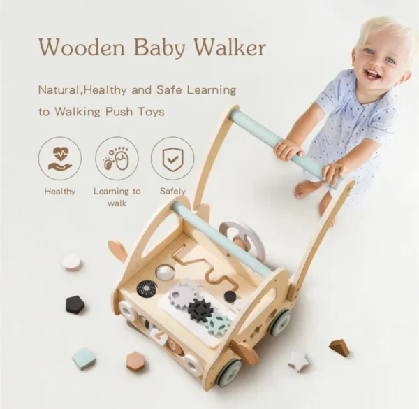 A baby pushing a wooden toy in the air.