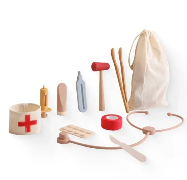 A wooden toy set of medical equipment and tools.