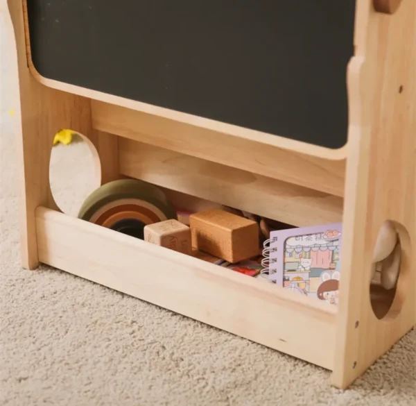 A wooden box with some toys inside of it