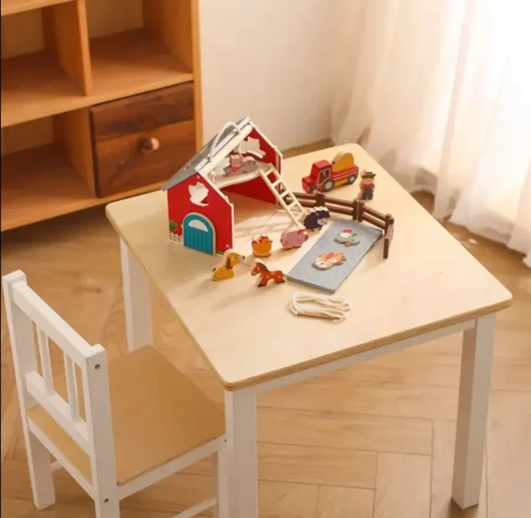 A table with a chair and some toys on it