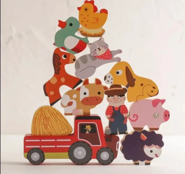 A wooden toy truck with farm animals on it.