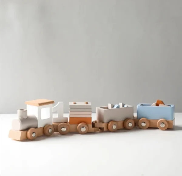 A toy train is shown with its wooden wheels.