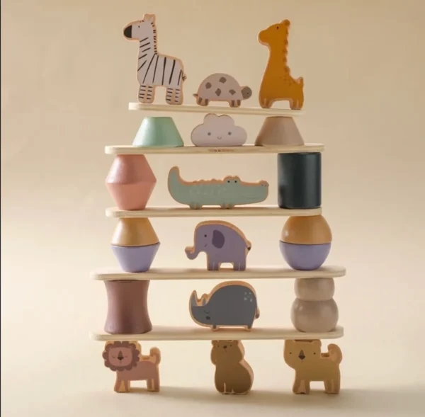 A stack of wooden toys with different animals on them.