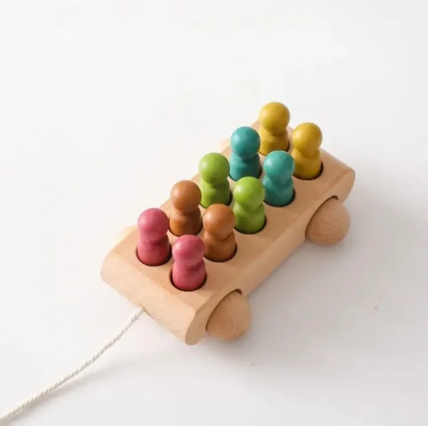 A wooden toy with many colored pegs on it.