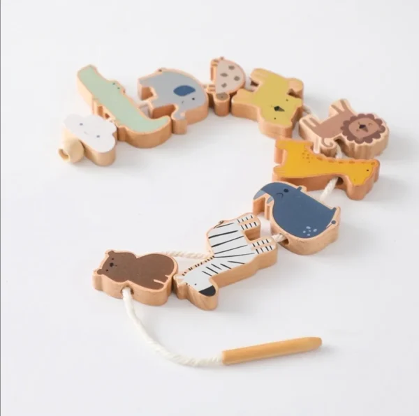 A wooden toy with animals on it