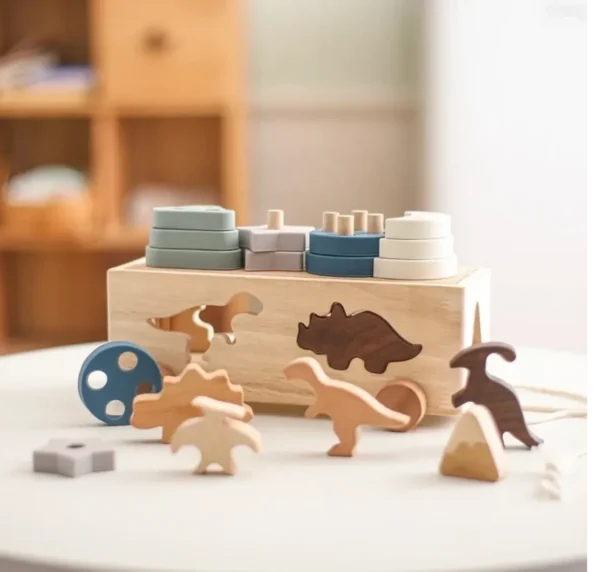 A wooden box with many different toys on it.