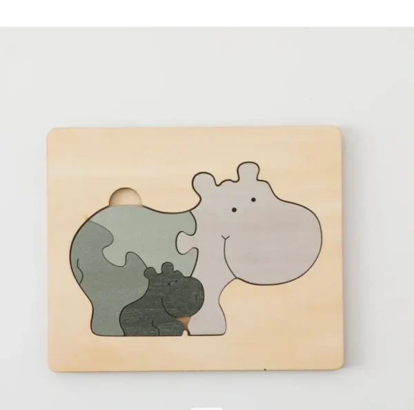 A wooden puzzle with an animal on it.