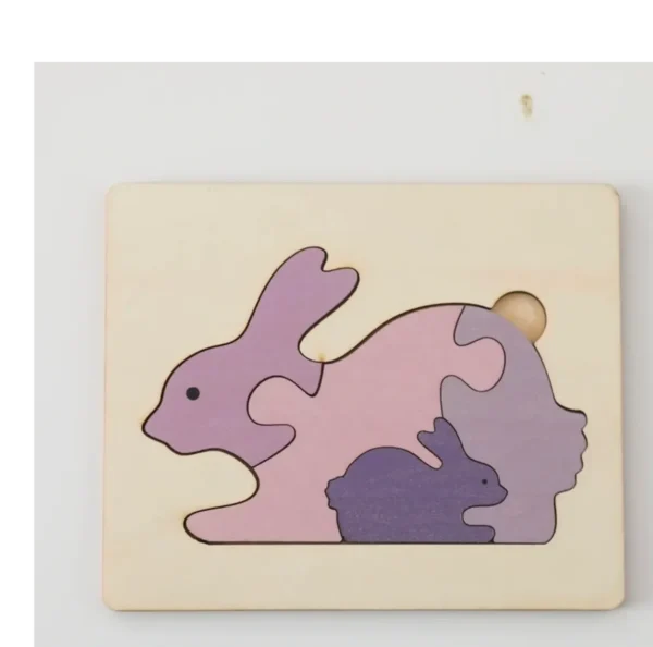 A wooden puzzle of an animal with purple colors.