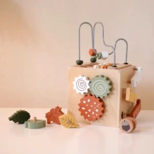 A wooden block with various shapes and colors.